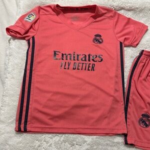 Emrites soccer jersey, coral and navy colored, size 22